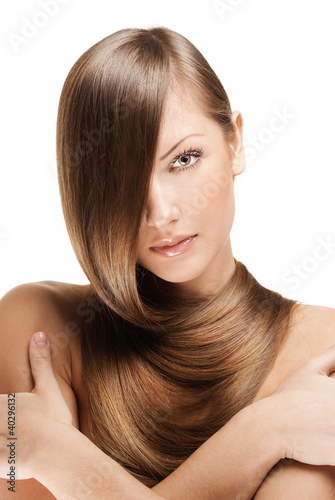 woman holding her elegant long shiny hair , hairstyle
