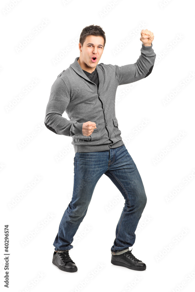 Full length portrait of a male gesturing happiness Full length portrait of a male gesturing happiness