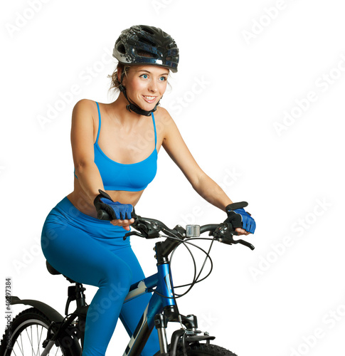 Woman riding a bike isolated on white