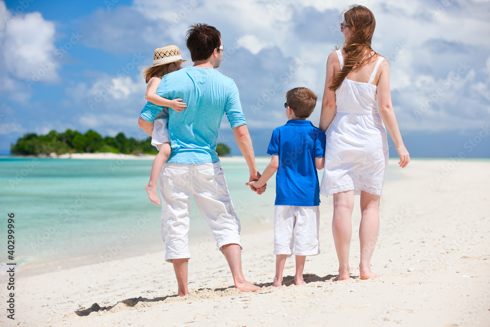 Happy family on tropical vacation