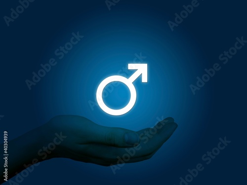 Shining male sex sign, man's hand on blue background