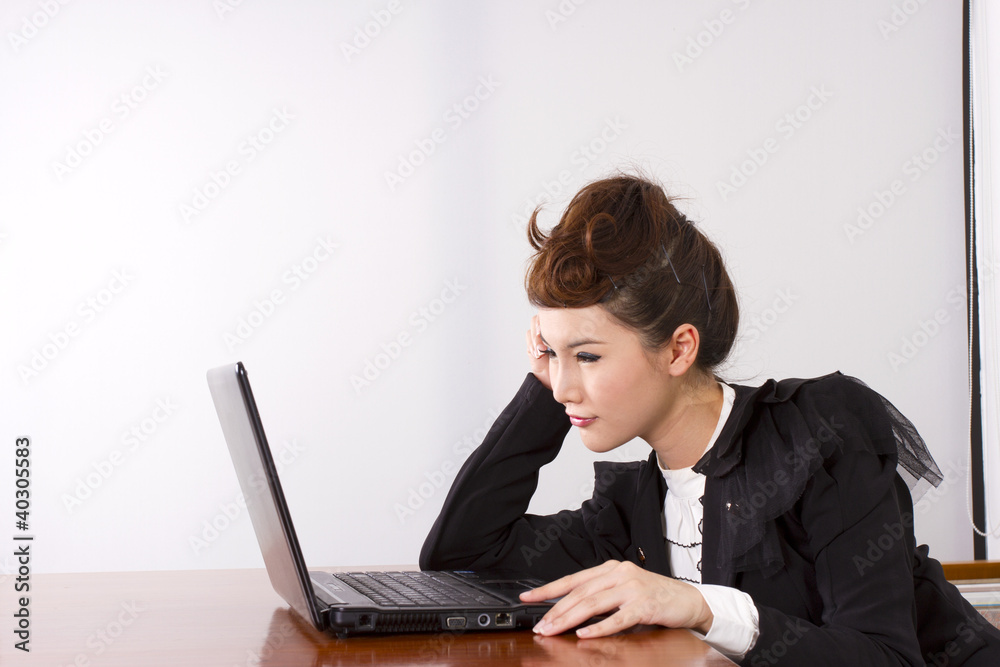 busy work, dress-up female model officer working with laptop. busy work, dress-up female model officer working with laptop.