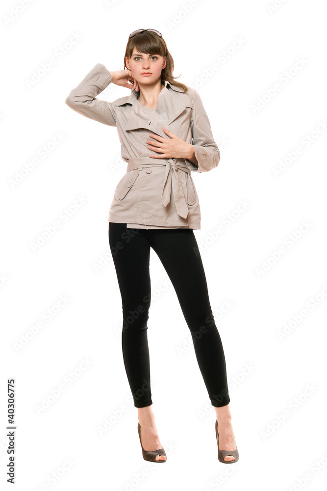 Cute young woman wearing a coat and black leggings Cute young woman wearing a coat and black leggings