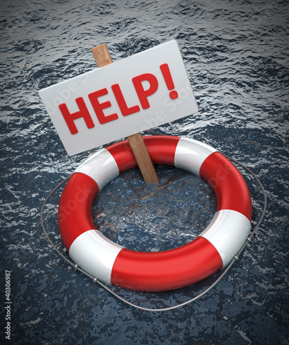 Red life buoy with a sign HELP in the water photo