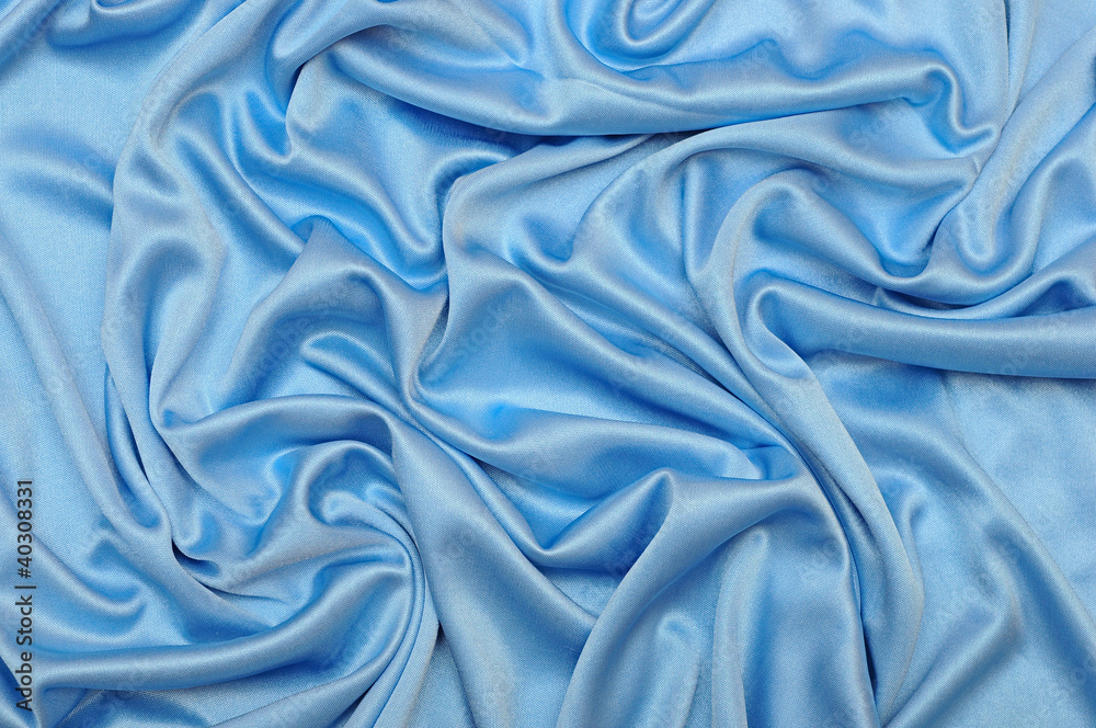 Fototapeta premium Smooth elegant blue silk can use as background