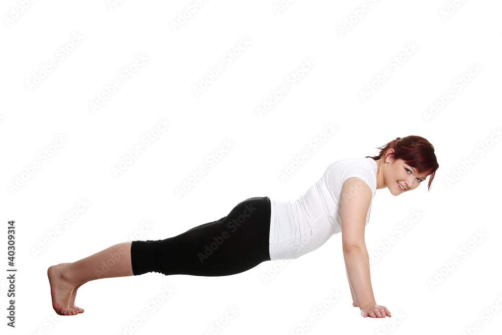 Young woman during fitness time and exercising Young woman during fitness time and exercising