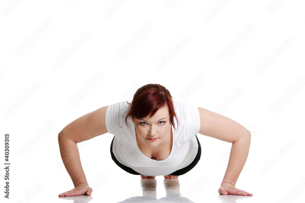 Fototapeta premium Young woman during fitness time and exercising