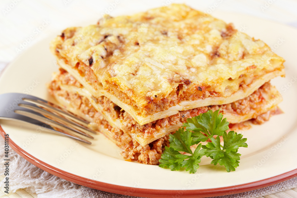 Italian cuisine. Meat lasagna on plate