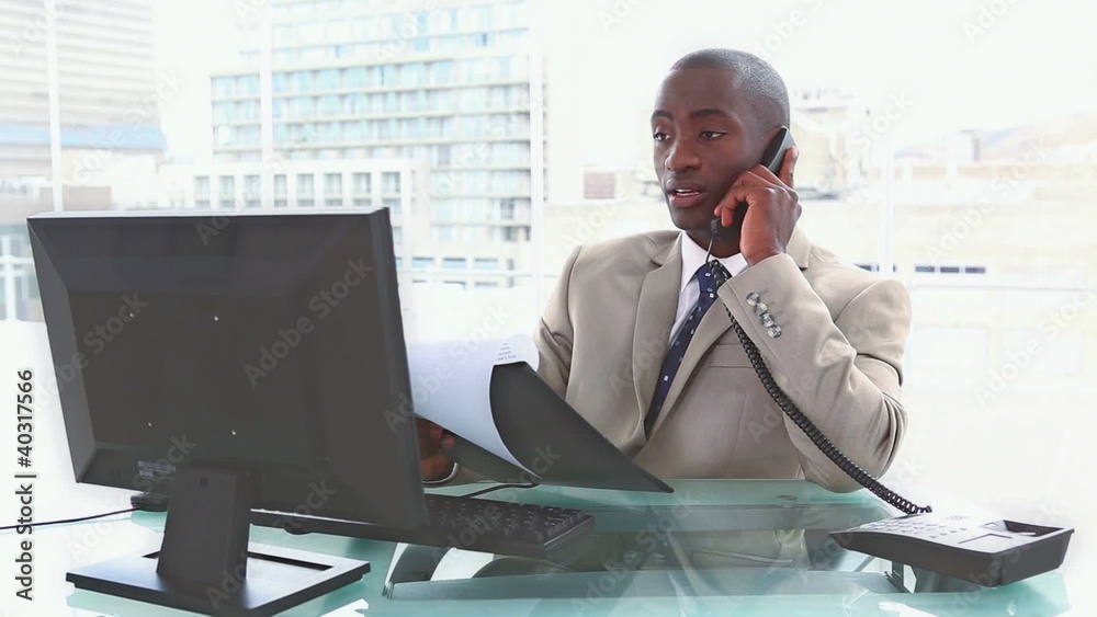 Worried businessman on the phone Worried businessman on the phone