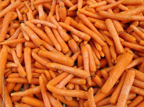 Lots of raw carrots close up.