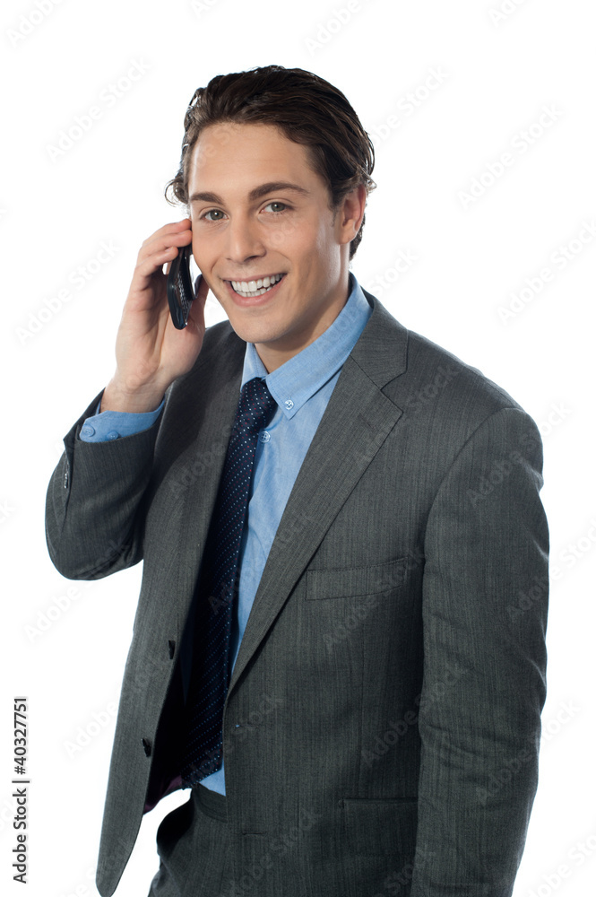 Portrait of a smiling businessman using a cellphone Portrait of a smiling businessman using a cellphone