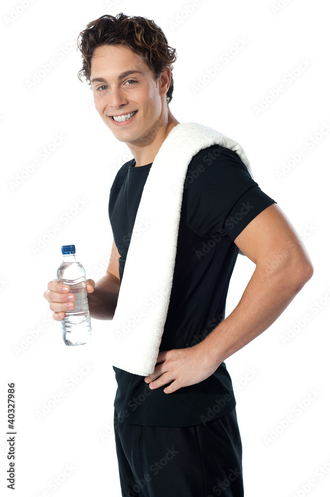 Image of a confident young sporty guy looking at you Image of a confident young sporty guy looking at you