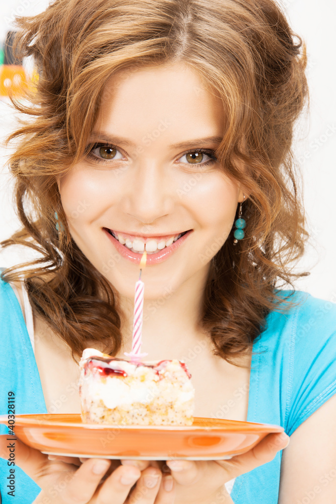lovely housewife with cake and candle