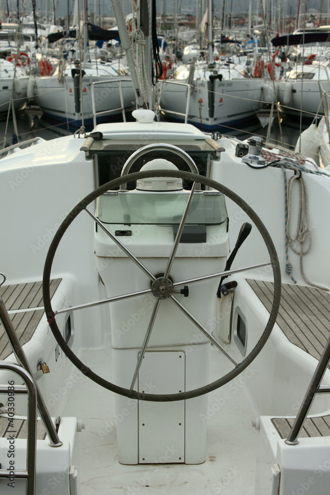sailing yacht cockpit and steering wheel