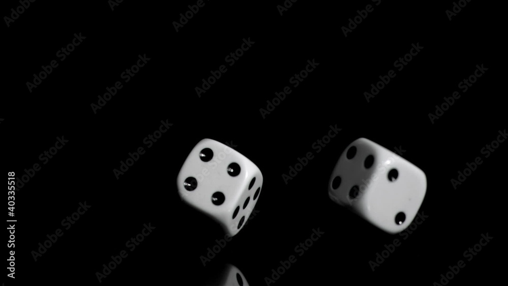 Two white dices in super slow motion rebonding Two white dices in super slow motion rebonding