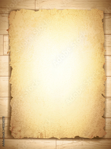 vintage grunge burnt paper at wooden background