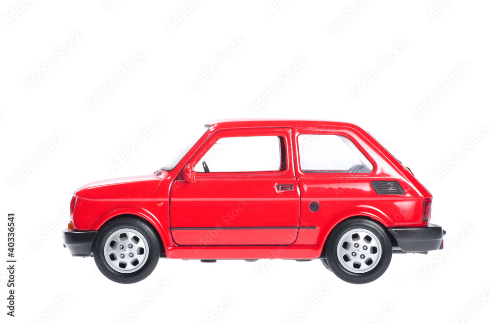 Small red car on white background. Small red car on white background.