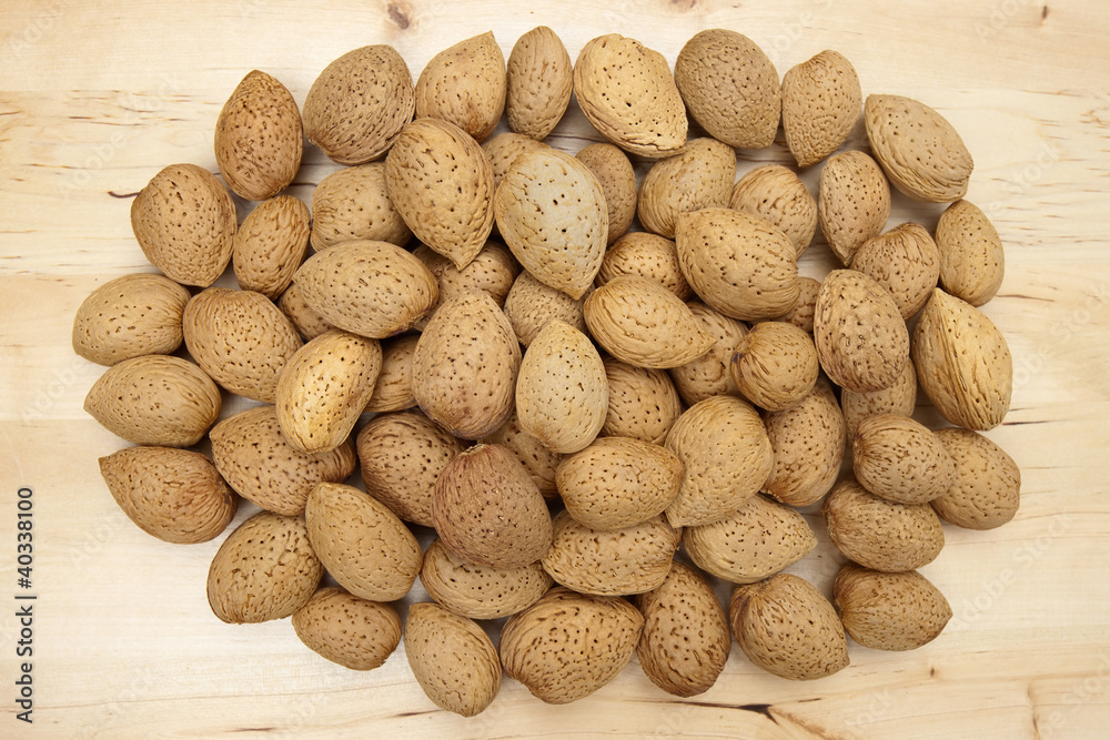 Almonds group on a wooden background Almonds group on a wooden background