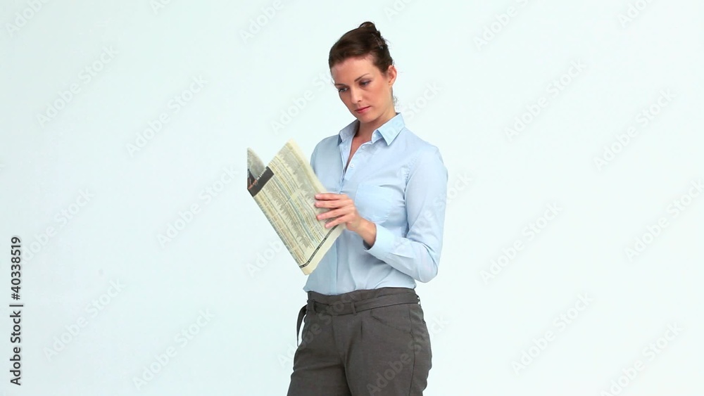 Happy businesswoman reads the news and crosses the arms Happy businesswoman reads the news and crosses the arms