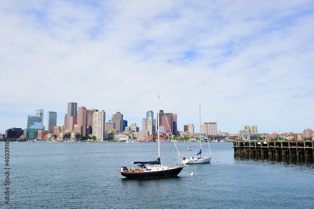 Sailing boat and Boston downtown