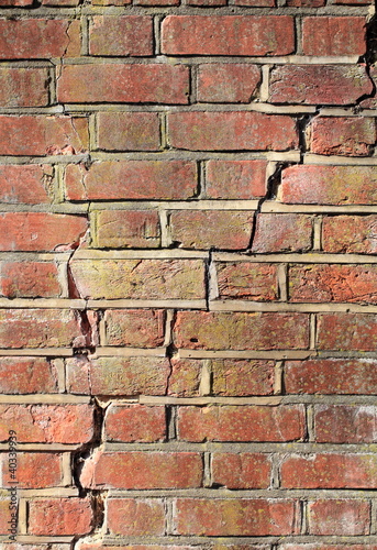 Cracking old brick wall