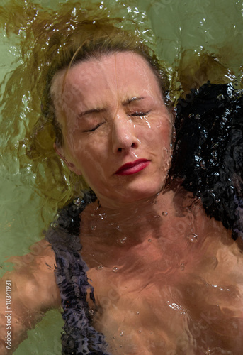 Face of woman underwater