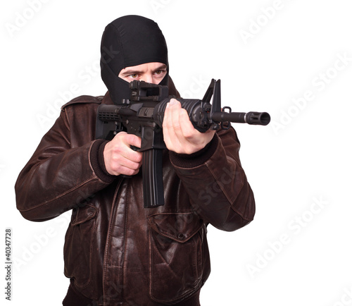 terrorist with rifle