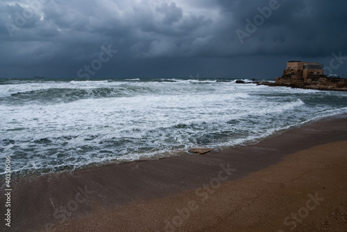 Ruins of harbor at Caesarea - ancient roman port in Israel