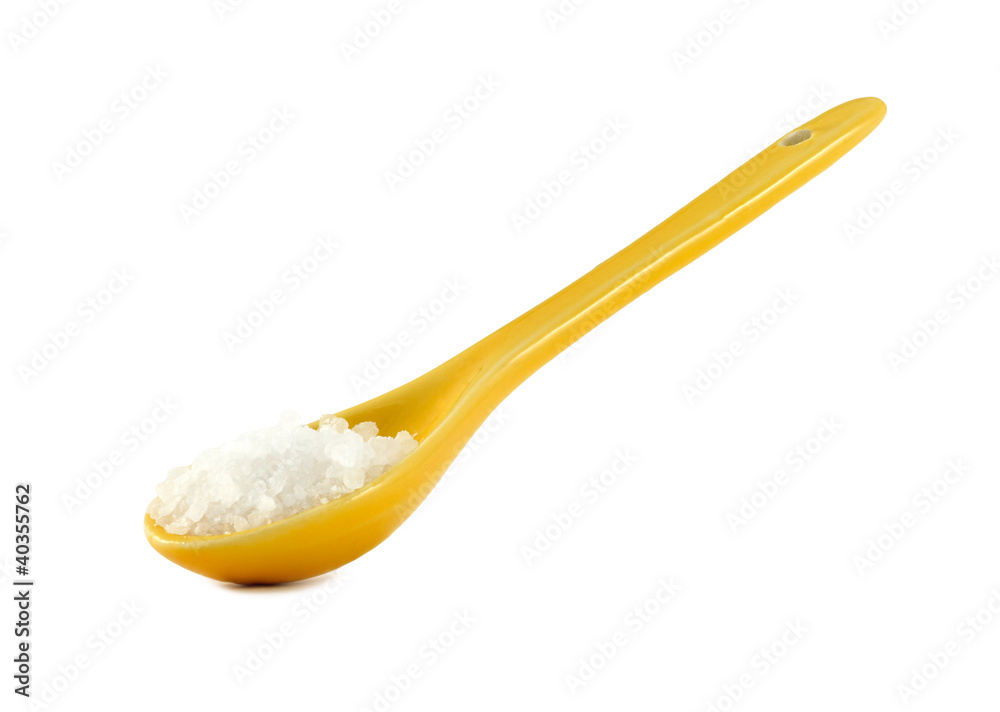 Salt on yellow spoon