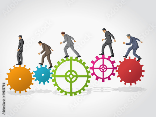 Business man over colorful machine gear wheel. Cogwheel.