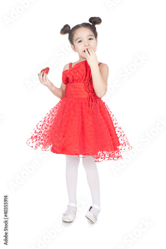Little girl with strawberry on white background