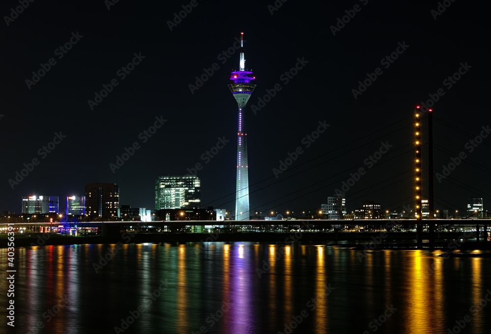 Dusseldorf, Rheinturm TV tower in night illumination