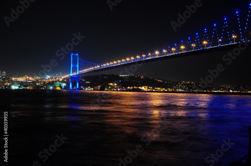 Bosporus Bridge at night with lights in Istanbul, Turkey