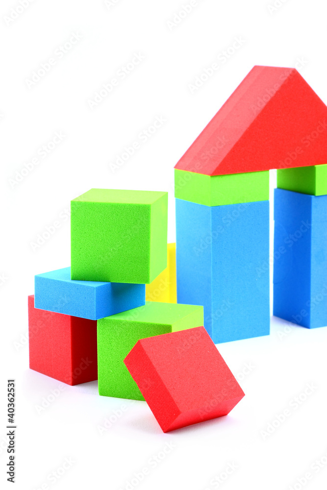 Fototapeta premium Colorful toy blocks isolated on white background