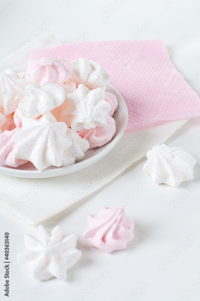 White and pink meringue on a plate White and pink meringue on a plate