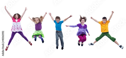 Happy kids jumping high - isolated