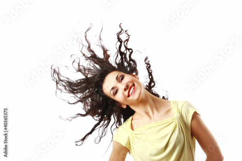 Happy woman with curly hair isolated