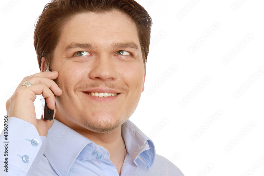 Closeup of a businessman with a mobile phone, isolated on white Closeup of a businessman with a mobile phone, isolated on white