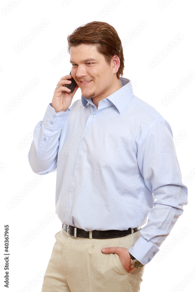 A businessman with a mobile phone, isolated on white A businessman with a mobile phone, isolated on white