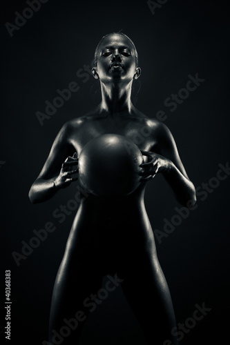 Metallic woman with ball