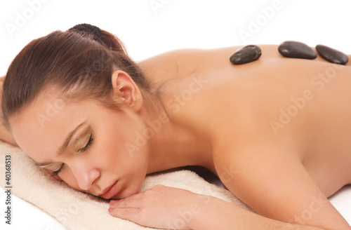 An attractive young woman getting a spa treatment
