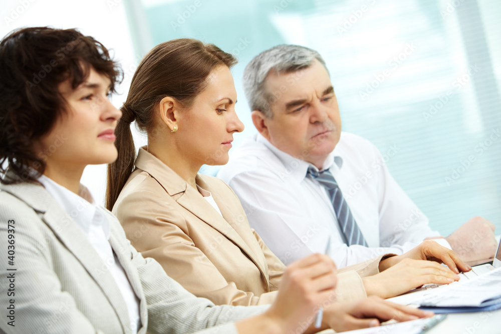Fototapeta premium Concentrated businesspeople