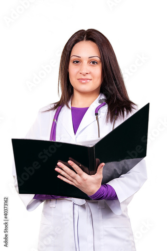 Young caring doctor or health care worker in white uniform, with
