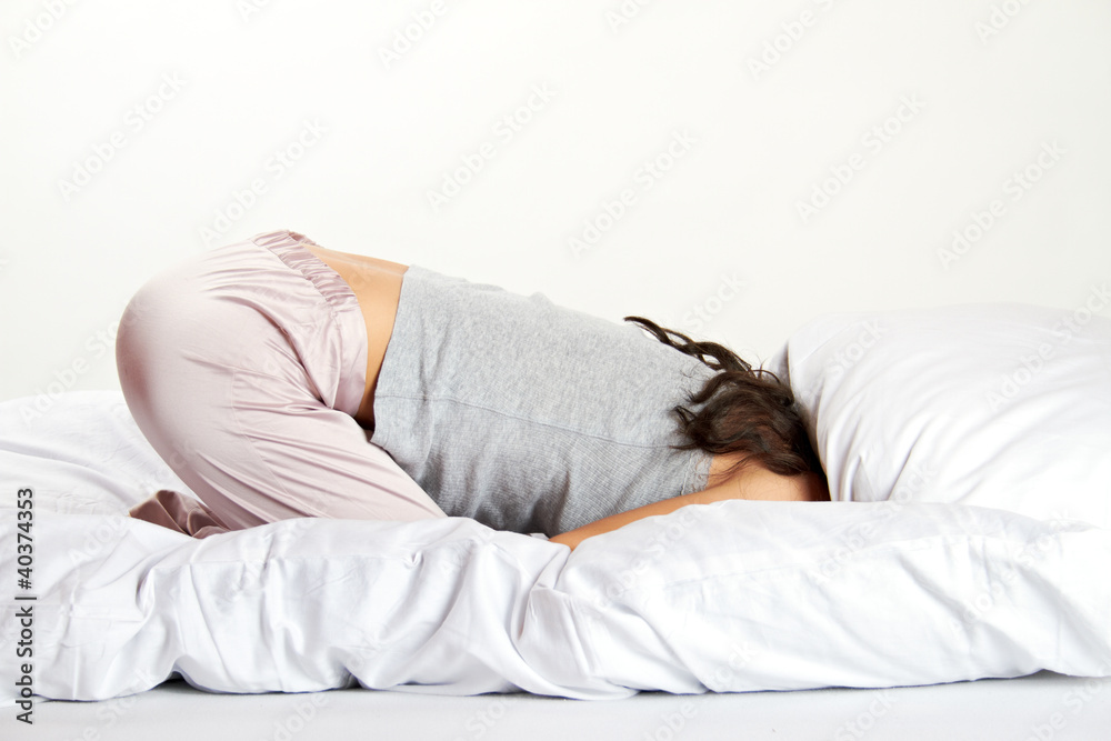 young woman in bed is hidding young woman in bed is hidding