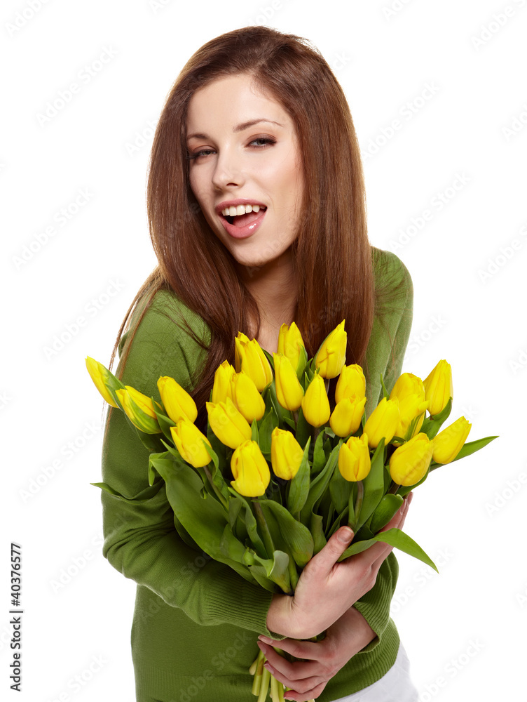 Woman with tulips bouquet of flowers smiling isolated on white Woman with tulips bouquet of flowers smiling isolated on white