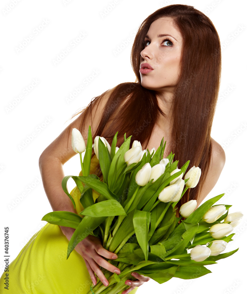 Woman with tulips bouquet of flowers smiling isolated on white Woman with tulips bouquet of flowers smiling isolated on white