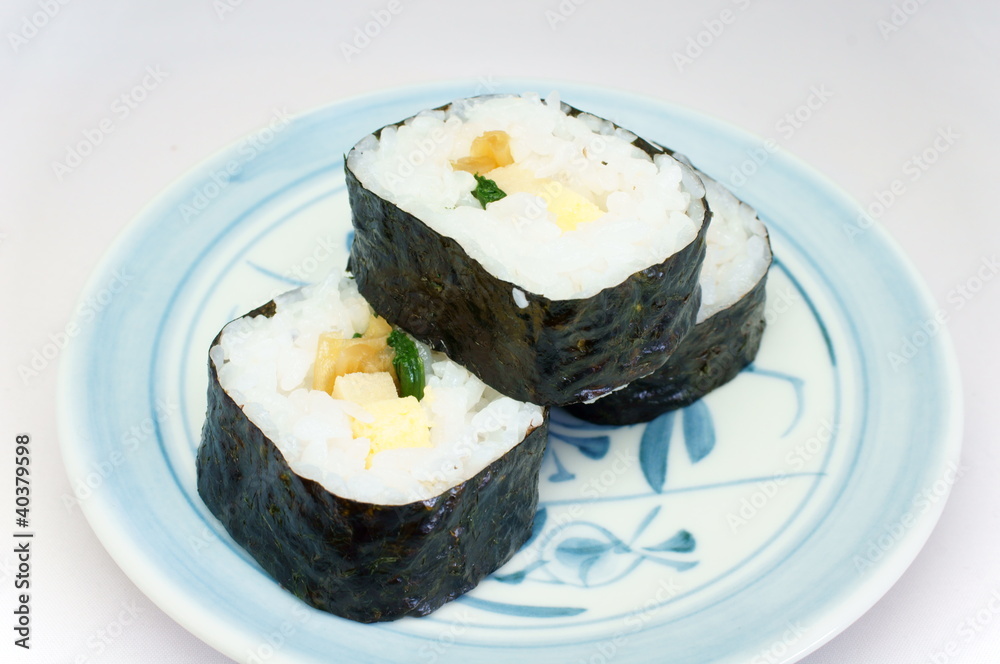 Sushi rolls . Nori outside Sushi rolls . Nori outside