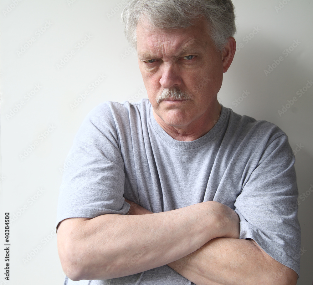 angry older man with his arms crossed Stock Photo Adobe Stock