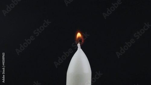 Candle being lit with a lighter