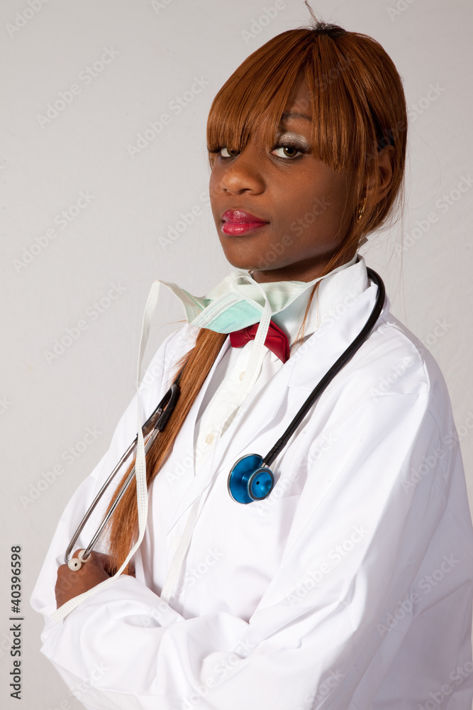 Healthcare worker, Black woman in lab coat with stethoscope Healthcare worker, Black woman in lab coat with stethoscope